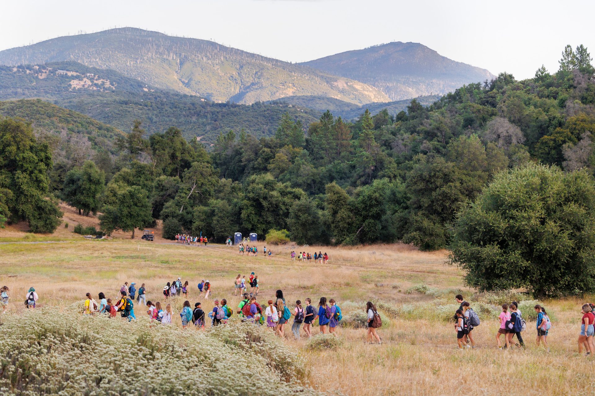 girls hiking through Camp Winacka